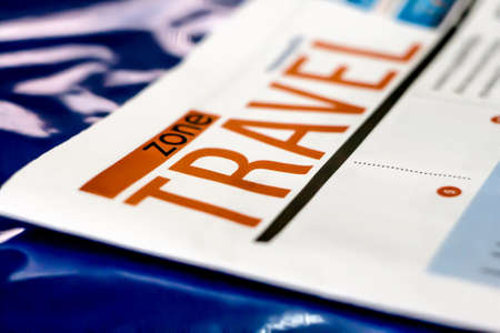 travel title, news paper, orange wording on white background