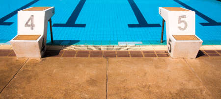 old swimming pool with blue color, lane for raceの写真素材