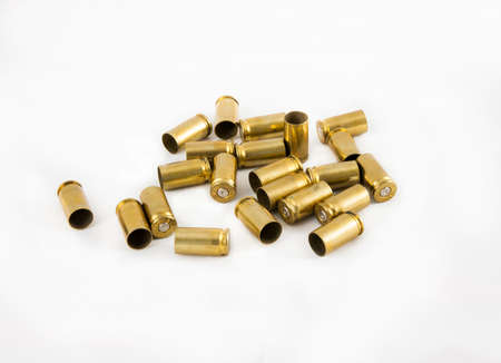 old 9 mm.  ammunition shell on white backgroundの写真素材