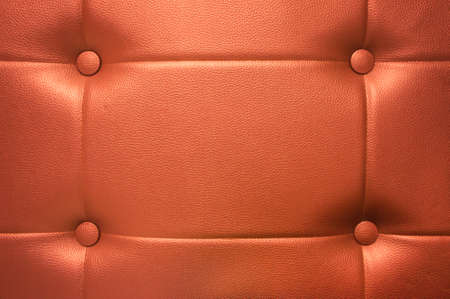 orange leather background texture with buttons decorated