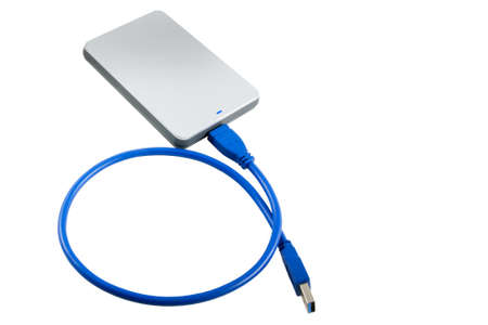 gray external hard drive with USB 3.0 cableの写真素材