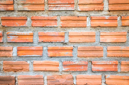 brick wall background with rough texture and surfaceの写真素材