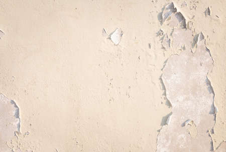 peeling of color painted on the wall, backgroundの写真素材