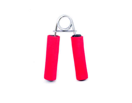 red handgrip, a tool for exercise on white backgroundの写真素材