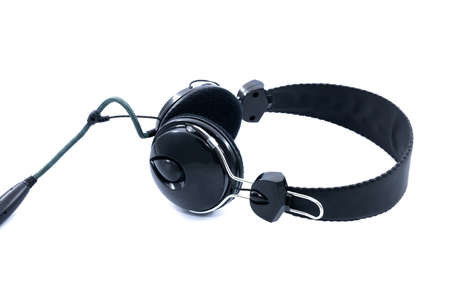 black headphones with wire on white backgroundの写真素材