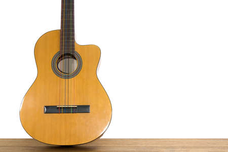 guitar classic on wood floor, isolated on white background, clipping pathの写真素材