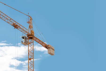 tower crane with blue sky and cloudの写真素材