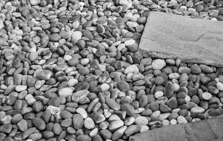 gravel stone from the river and stone pavement, black and whiteの写真素材