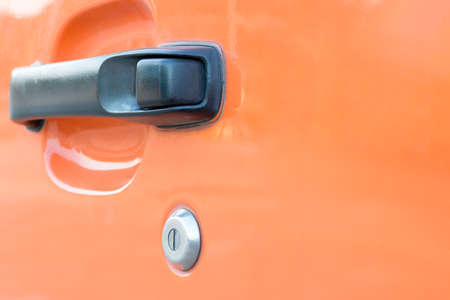 black handle car and key on vehicle doorの写真素材