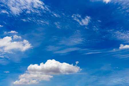 Cirrostratus, cirrus,   cumulus clouds on blue skyの写真素材