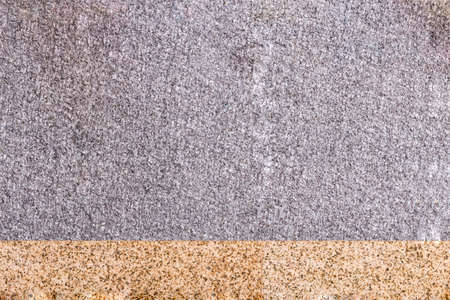 granite stone background with two tone orange and blackの写真素材