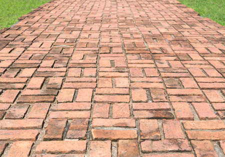 old red brick walk way , abstract background