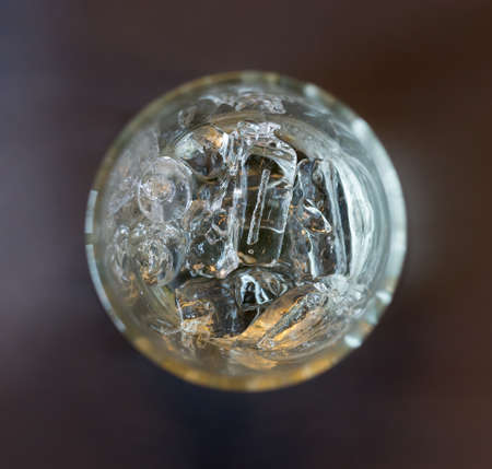 ice in glass, dark tone , selective focusの写真素材