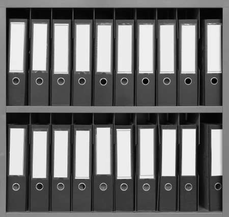 Document files on a Stainless steel shelf, black and white tone