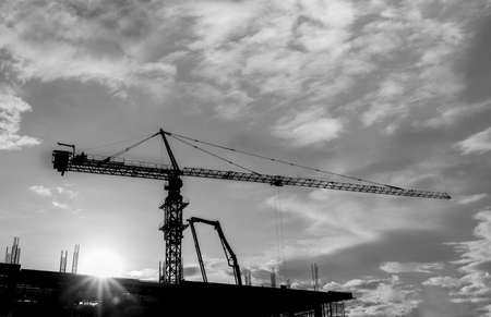 tower crane in construction site, black and white tone, industry concept backgroundの写真素材