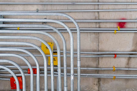 electric conduit and sanitary fire pipe work, industry construction concept backgroundの写真素材