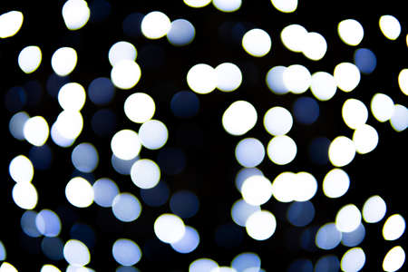 abstract bokeh glowing in black background