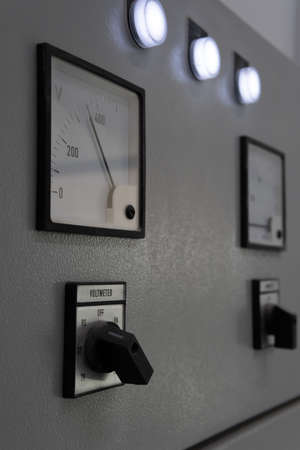 volt meter on electric box with switch, industry and construction background conceptの写真素材