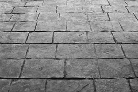 concrete floor pattern background in dark tone, black and whiteの写真素材