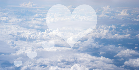 blue sky with white, soft cloudsの写真素材