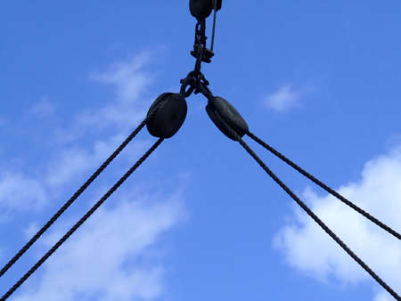 Pulley ropes on tall shipの写真素材