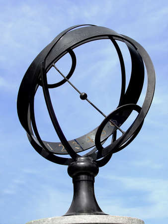 Unusual metal globe sun clockの写真素材