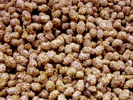 Pile of sesame nuts balls on a spice marketの写真素材