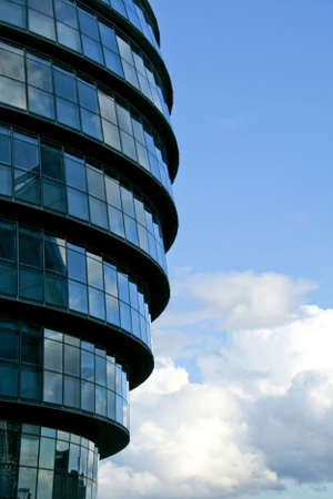 Unusual oval glass building in step constructionの写真素材