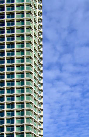 Concrete tall building part with square windows