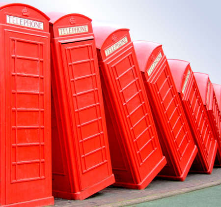 Classic British red telephone box in group