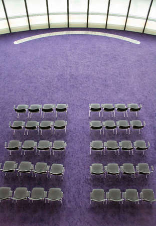 Grey amphitheatre congress seats in row orderの写真素材