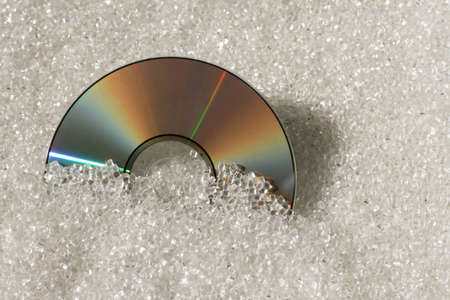 One compact disk with plastic granulate material