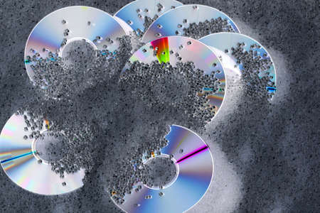 Bunch of positive DVDs with grunge backgroundの写真素材