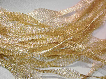 Precision filigree net made from fine gold