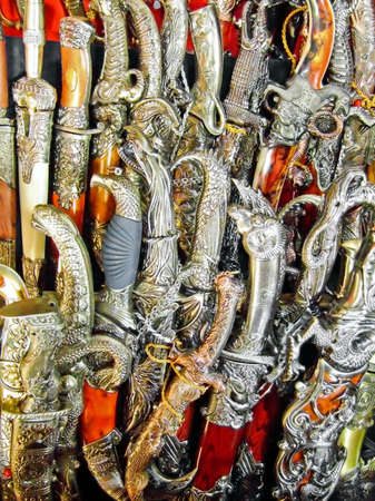 Old style medieval Turkish decorated long knifesの写真素材