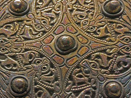 Ancient engraved brass ornament pattern close upの写真素材