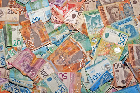 A bunch of colorful Serbian money banknotes の写真素材
