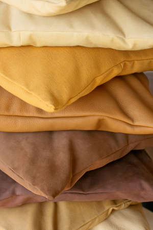 Different decorative pillows made from real leatherの写真素材