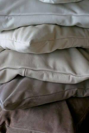 Grey decorative pillows made from real leatherの写真素材