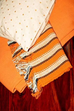 Blanket and pillow on the wooden bedの写真素材