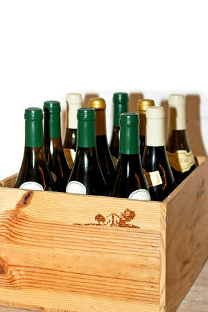Bunch of wine bottles in the wooden boxの写真素材