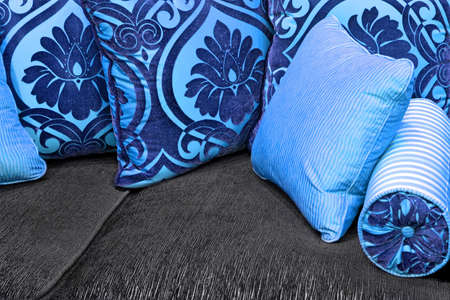 Blue decorative pillows made from floral textile