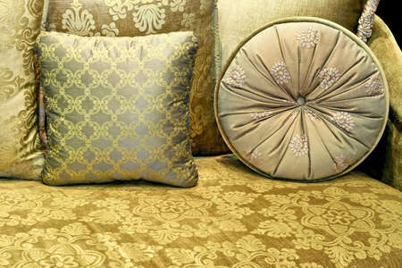 Green decorative pillows made from decorative textileの写真素材