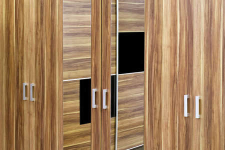Wardrobe dresser doors made from textured woodの写真素材