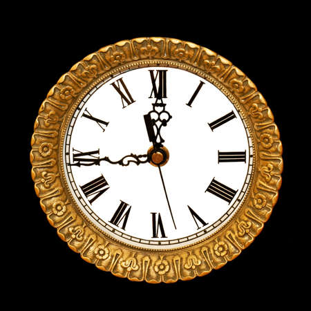 Very old analogue clock with roman numbers