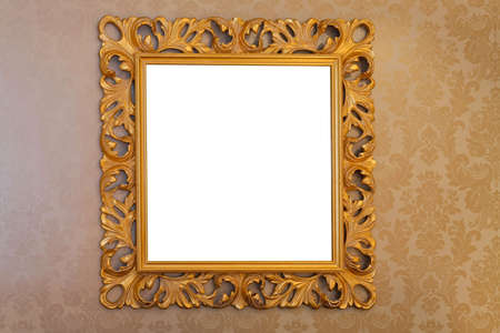 Golden and engraved old style picture frameの写真素材