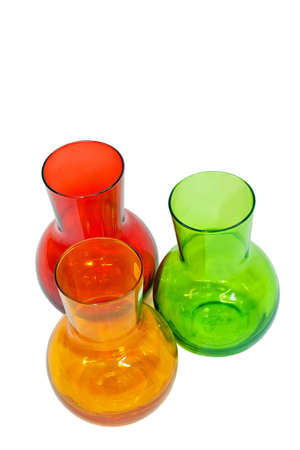 Three glass vases in vivid colors isolated の写真素材