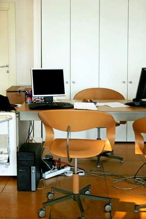 Interior view of office with brown desk