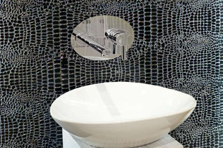 Artistic style oval basin with special mirror tilesの写真素材