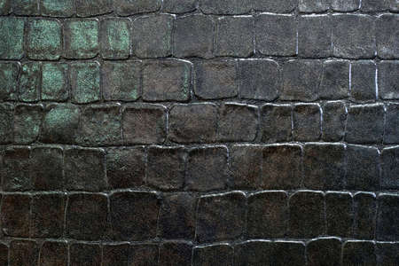 Black tiles with grunge shape engraved elements 